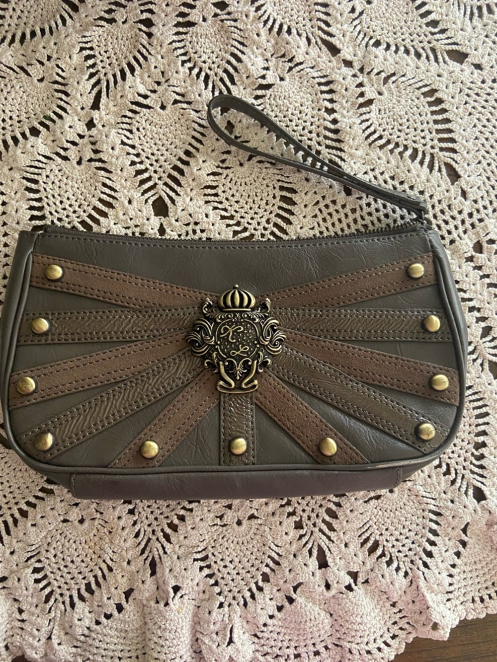 Kate Landry Brown and Taupe Decorative Crest Wristlet